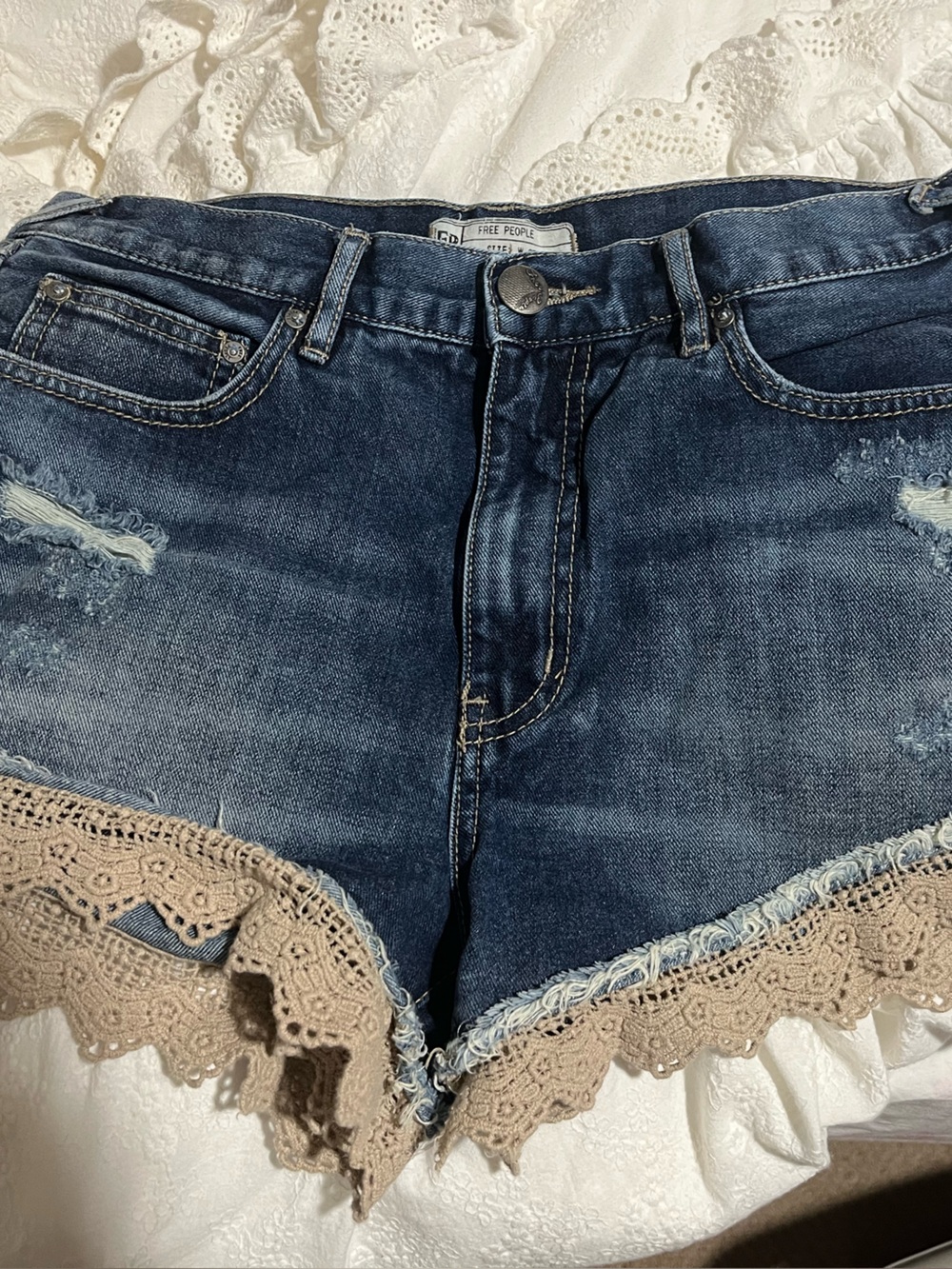 Free People Indigo Denim Shorts with Beige Crochet Hem